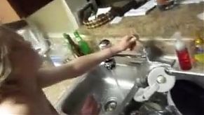 fucking slut in the ass doing dishes.